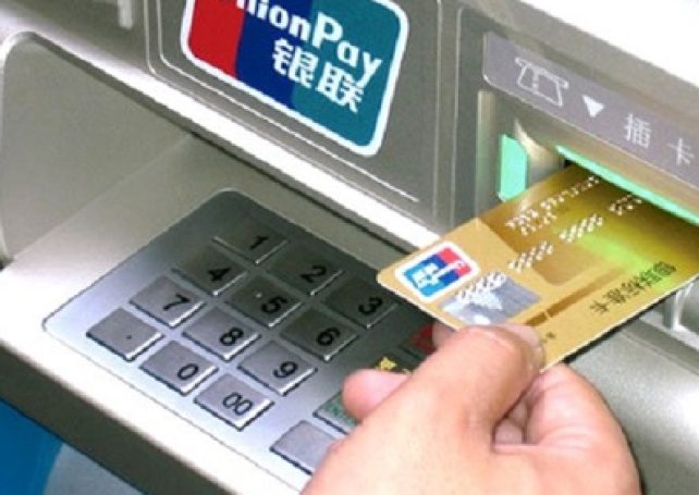 Macau ATMs need face time before payout to follow the money