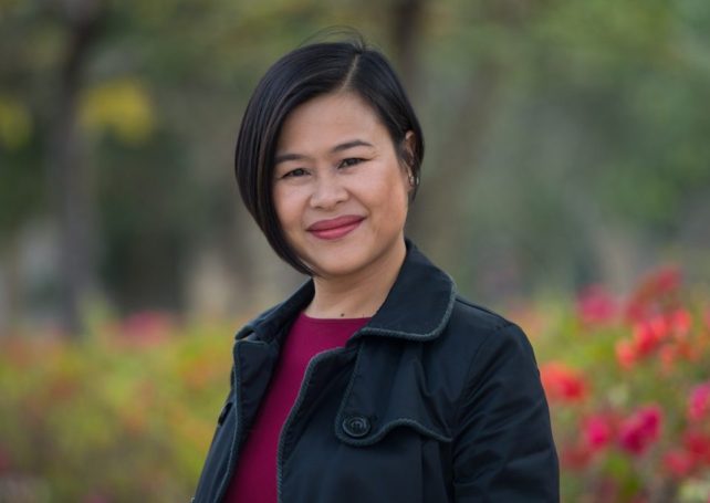 Scholar says she will be middle-of-the-road-lawmaker