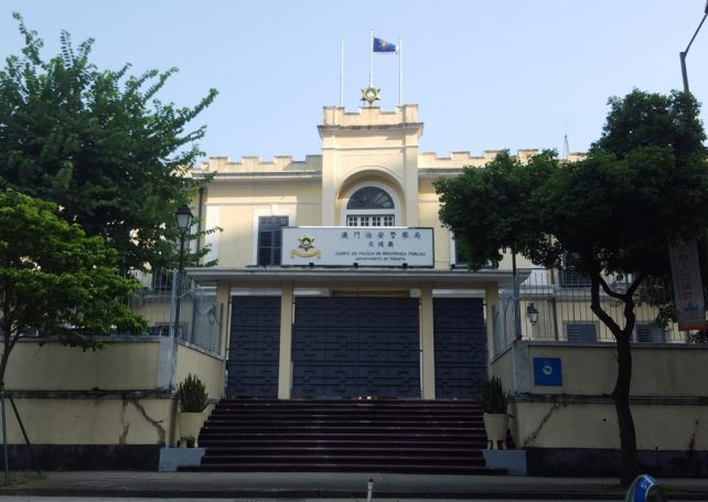 2 nabbed in Macau for sticking paper on wall