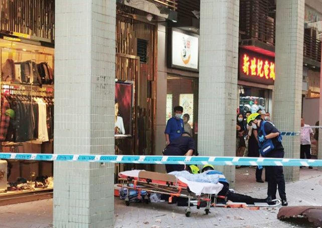 Falling canopy from high-rise seriously hurts pedestrian