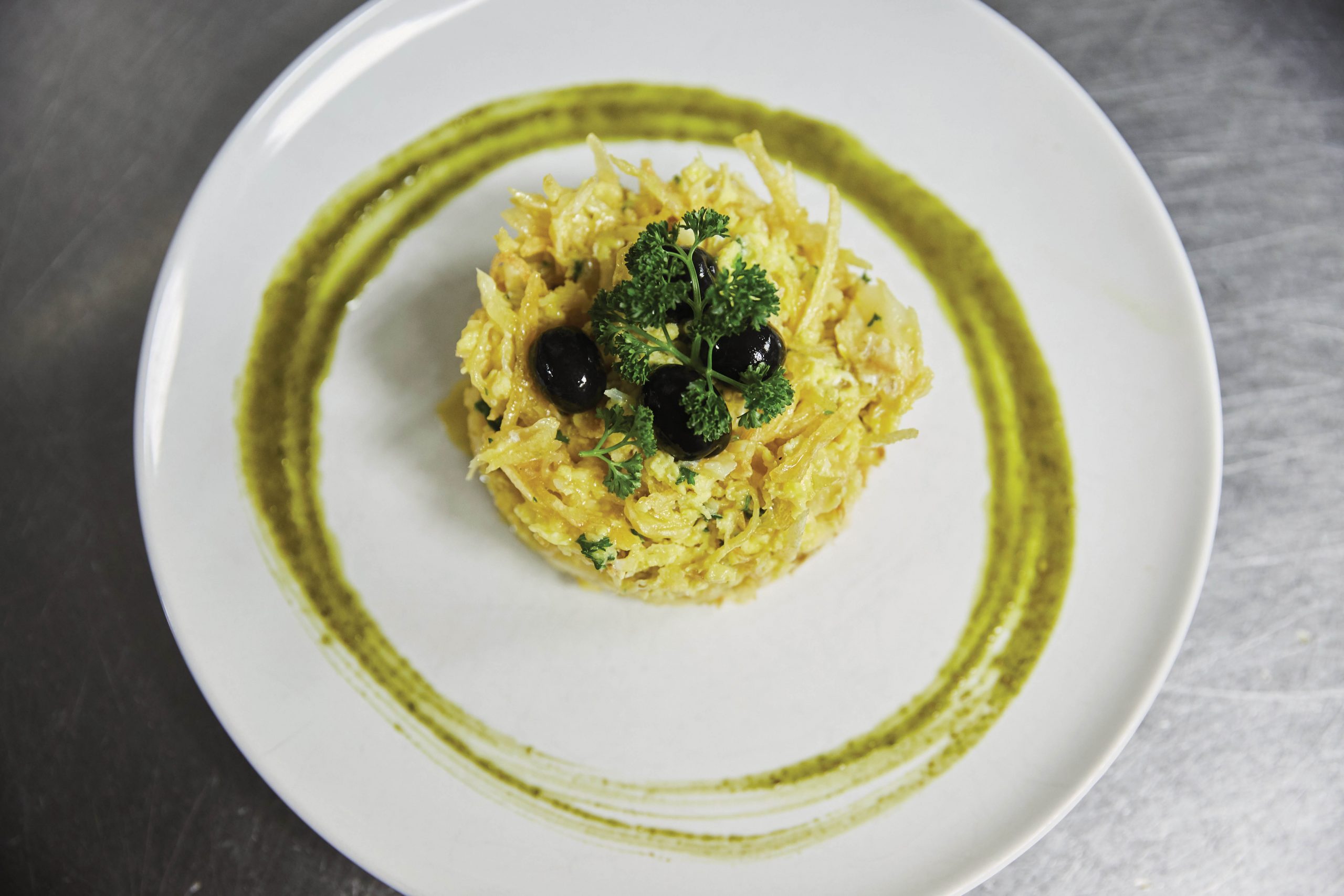 ‘Bacalhau à Brás’: salted dry codfish with onions, potatoes and scrambled egg - Photo by António Sanmarful