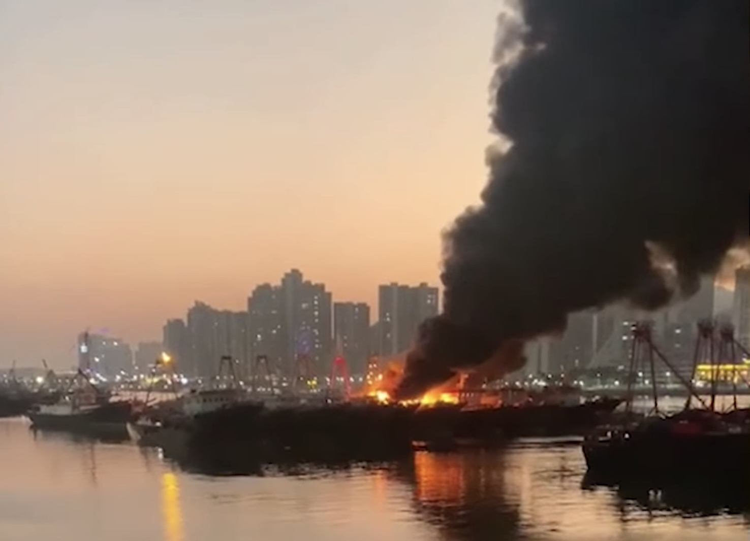 Three fishing boats engulfed in harbour blaze