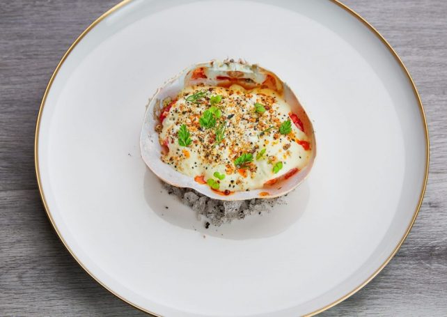 The famous Macanese-style stuffed king crab meat in shell