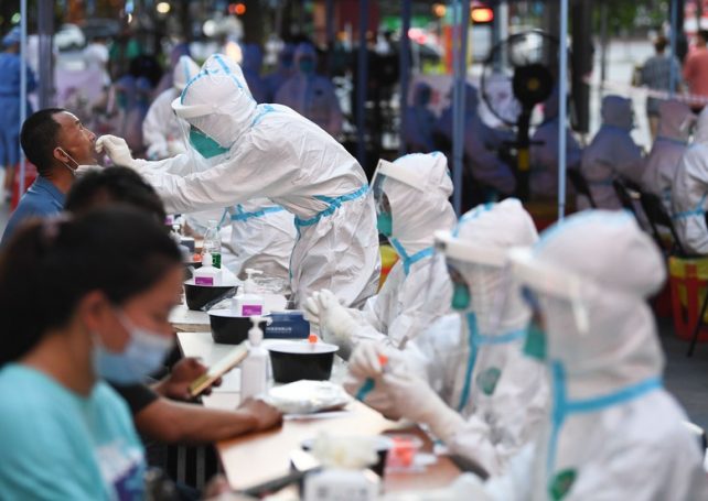 18,000 travellers barred from leaving Guangzhou