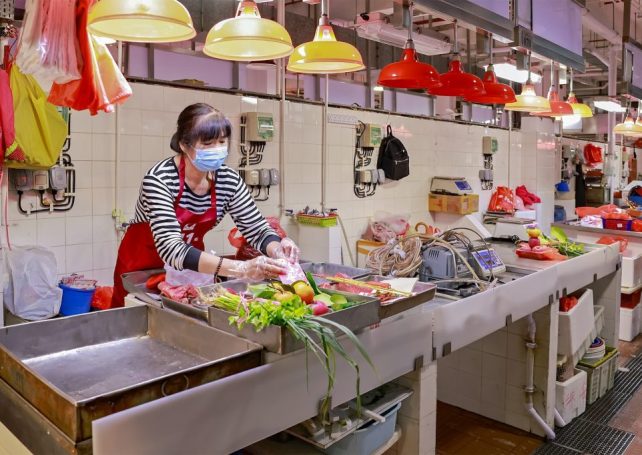 Macao students rally to help struggling Red Market traders