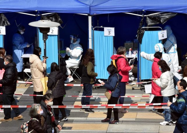 Three arrivals test positive as Hong Kong’s new Covid-19 cases top 55,000