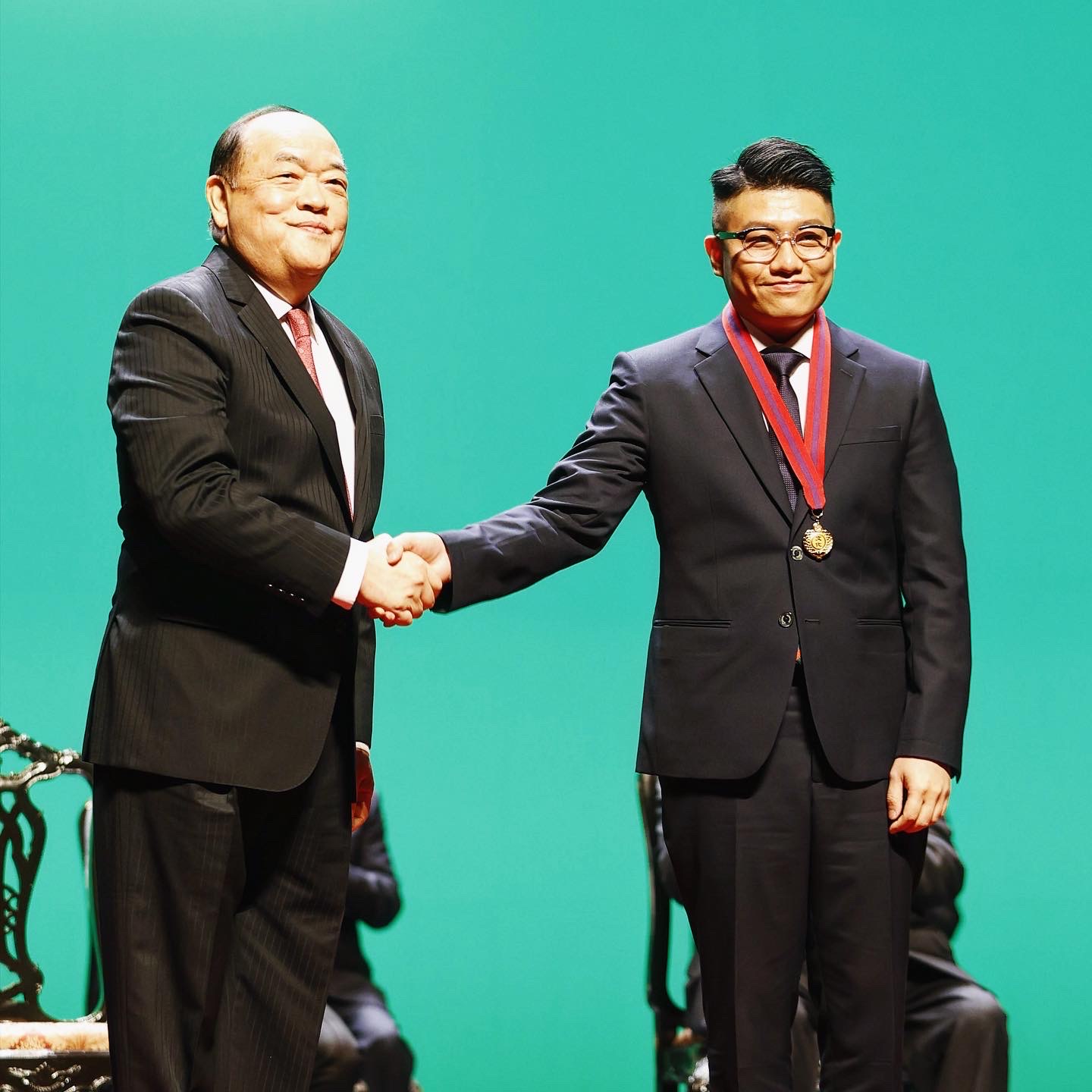 Au Chon Hin with Chief Executive Ho Iat Seng