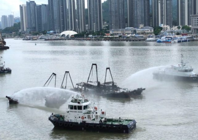 Oil slick pollutes harbour following mystery blaze aboard six fishing boats