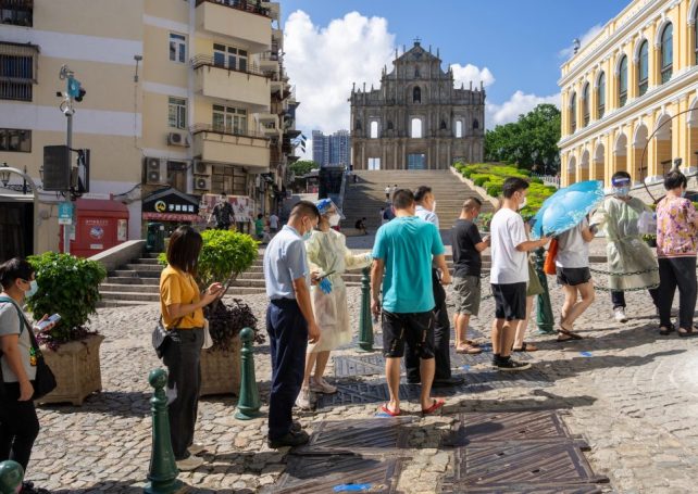 Macao paused for the third time this month by mass-testing as Covid-19 cases hit 299