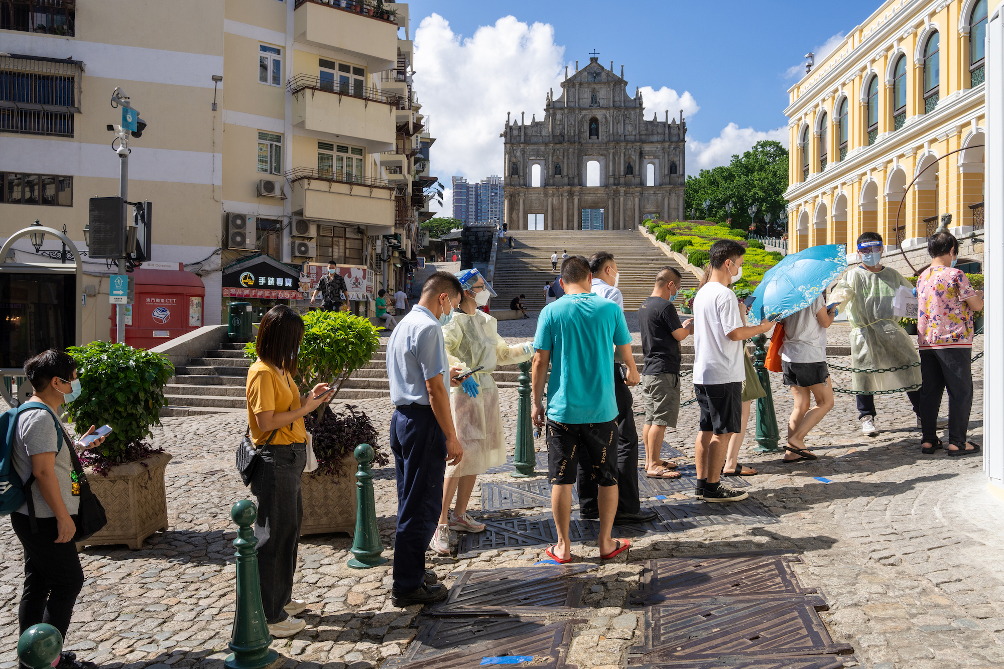 Macao paused for the third time this month by mass-testing as Covid-19 cases hit 299