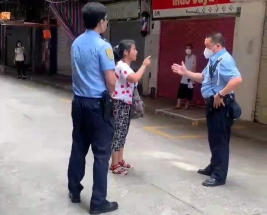 Unmasked woman demands to see Chief Executive after being stopped by police