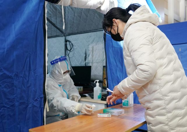 China downgrades Covid-19 from pneumonia to infection