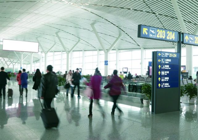 China reopens to foreigners, ending an effective ban imposed because of the pandemic