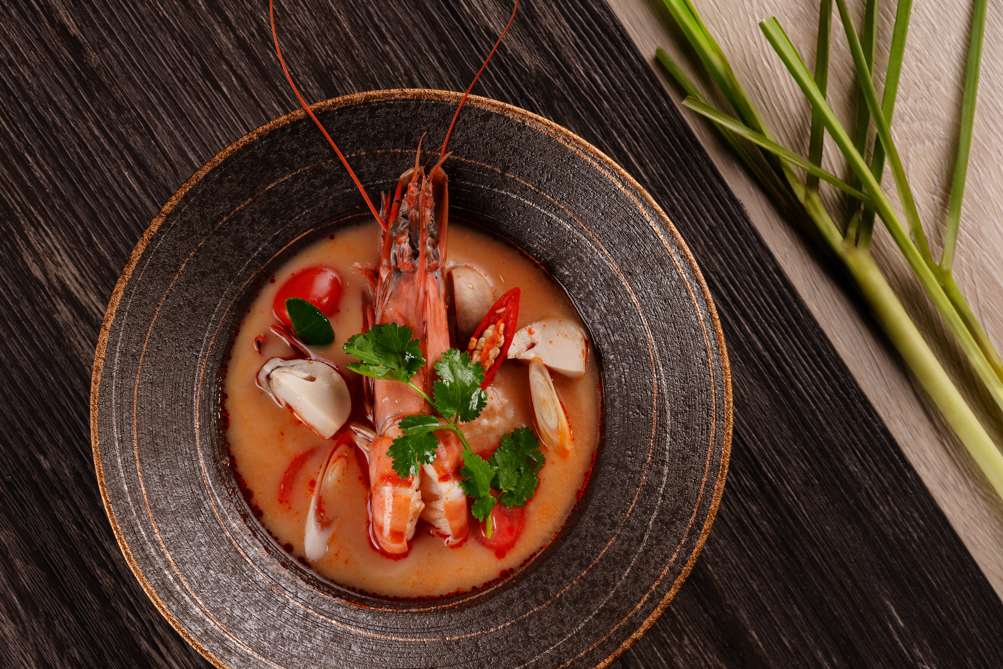 Ruangnukulkit stays true to tradition with many dishes, including her tangy tom yam served with plump tiger prawns
